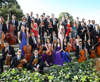 Grupo de músicos y músicas