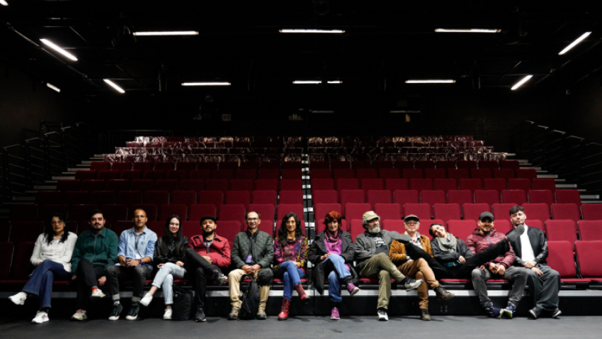 personas reunidas en teatro